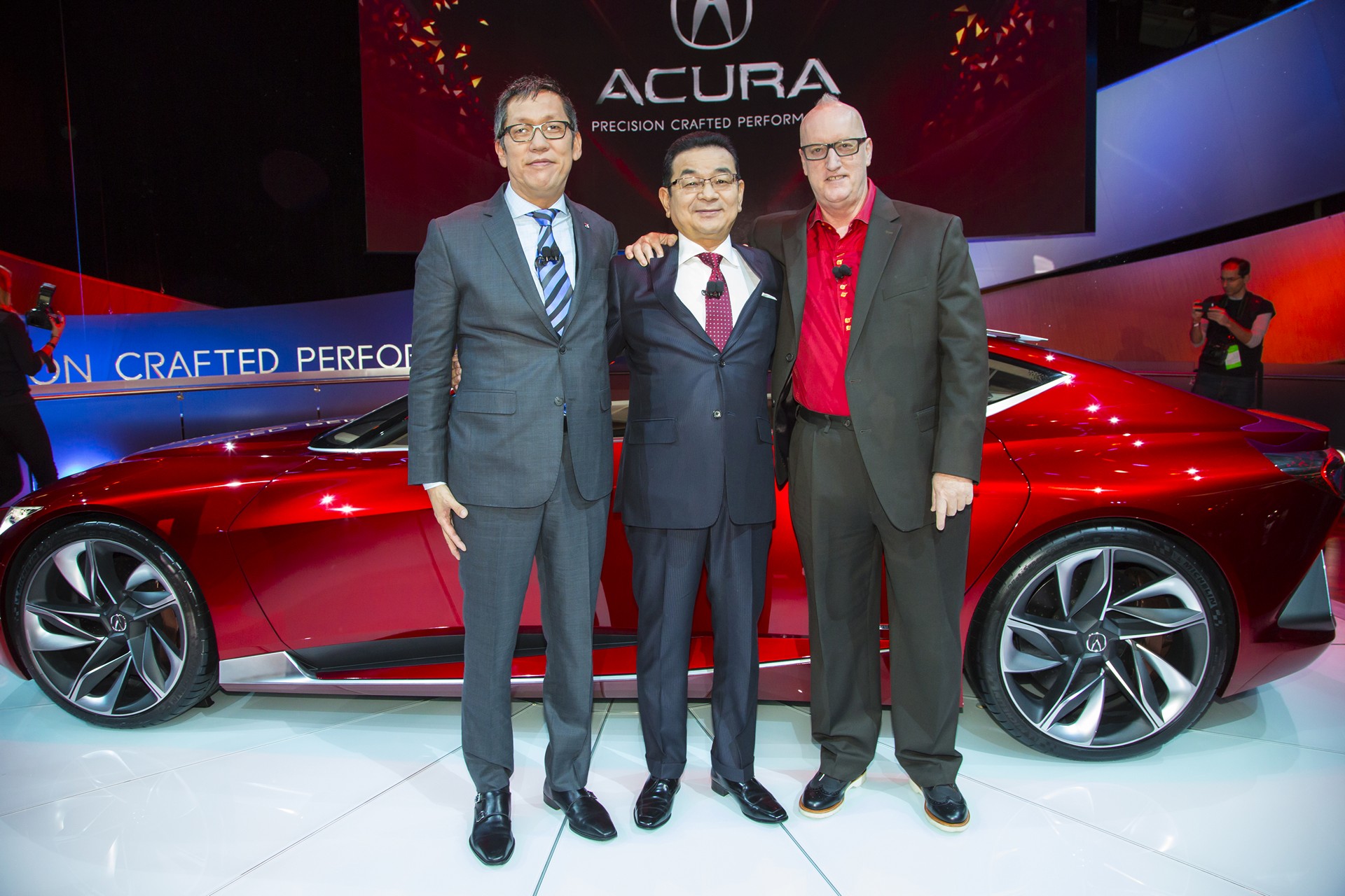 From left to right, Jon Ikeda, Vice President and General Manager, Acura Division, Takahiro Hachigo, President and CEO of Honda Motor Co., Ltd. and Dave Marek, Acura Global Creative Director, at the 2016 North American International Auto Show unveiling of the Acura Precision Concept in Detroit © Honda Motor Co. Ltd.