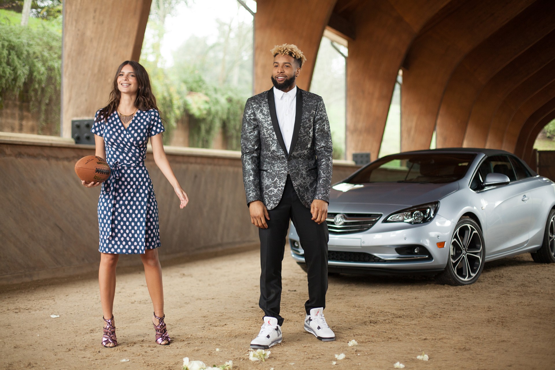 Odell Beckham, Jr, Emily Ratajkowski, and the new Cascada convertible on the set of Buick’s first Super Bowl commercial © General Motors