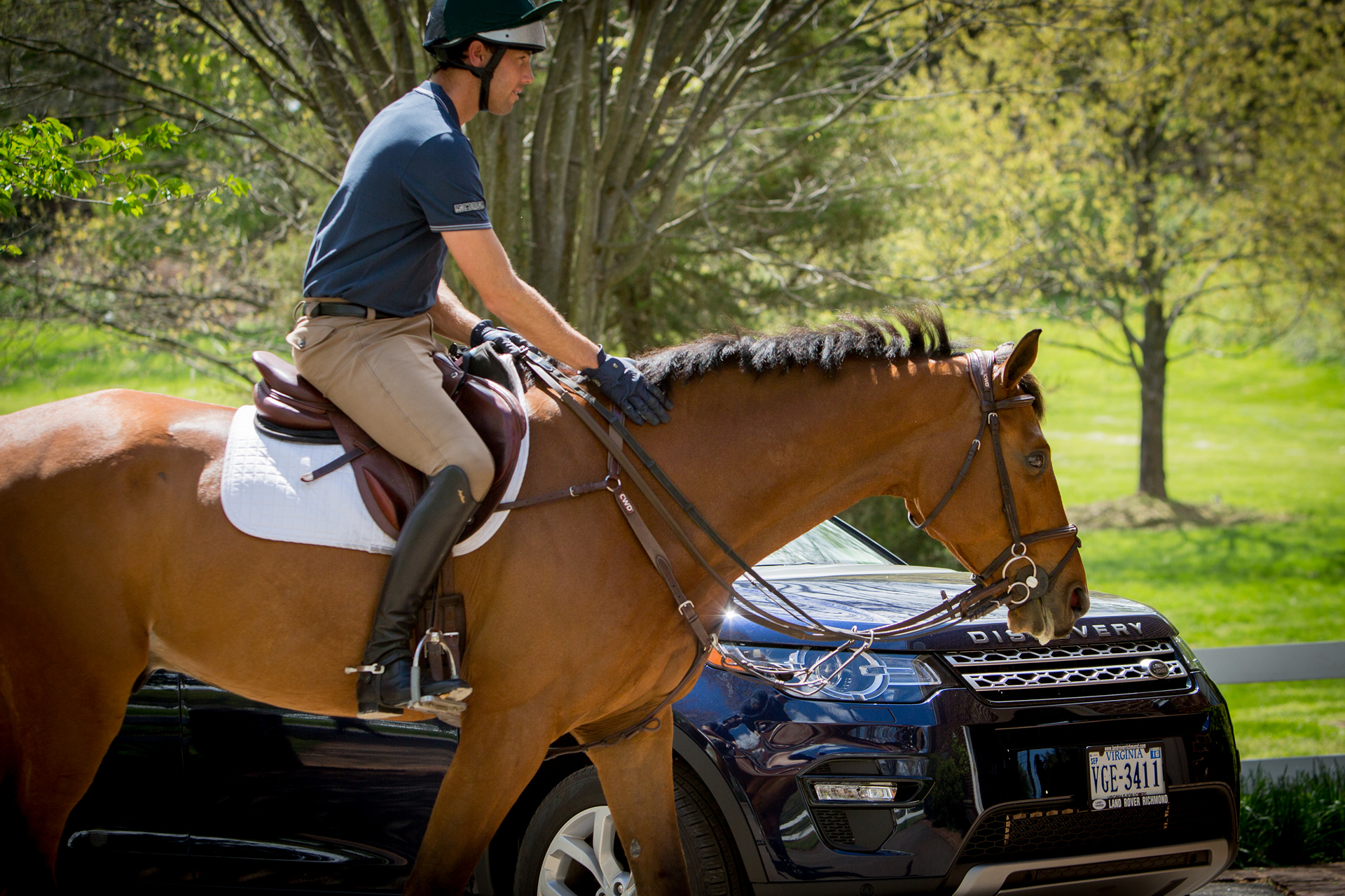 Will Coleman tack trunk at his Virginia based stable with his 2016 Land Rover Discovery Sport in background © Tata Group